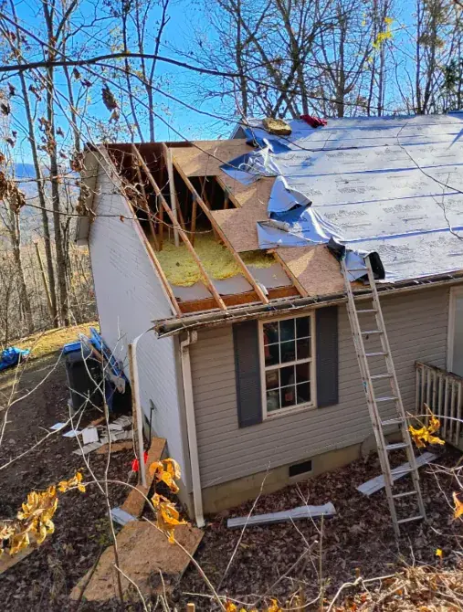 Standing-seam metal roof on a mountain home — Marshall area roof replacement by Southern Star Roofing